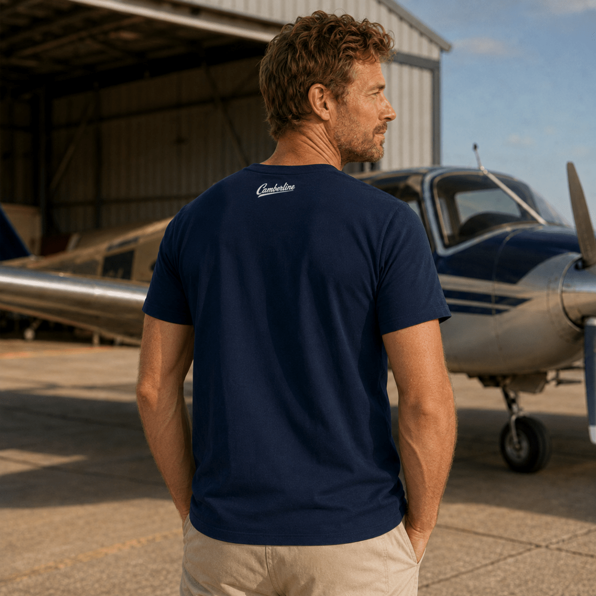 Model wearing Silver Spirit navy aviation T-shirt, back view