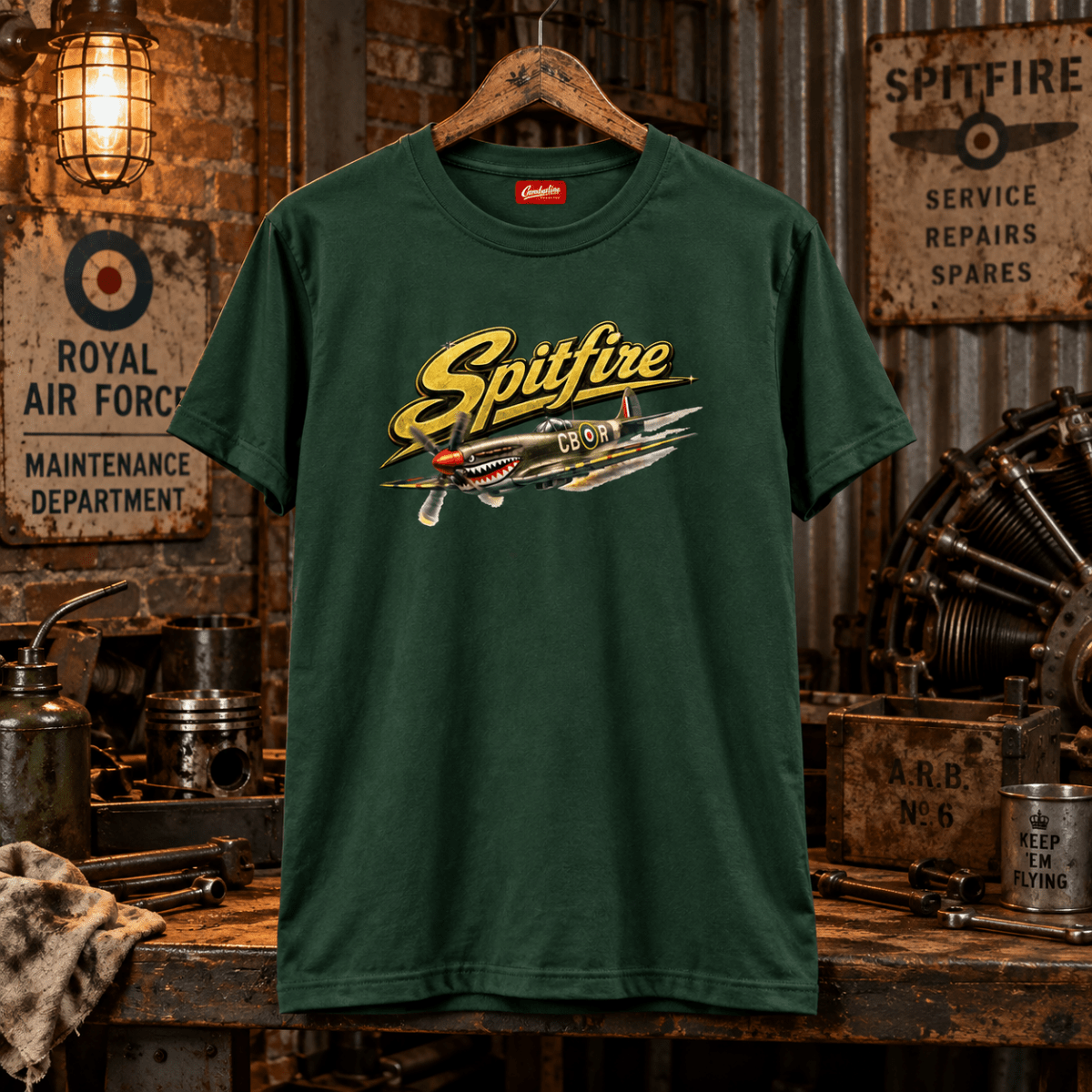 Spitfire shark-tooth forest green T-shirt in a gritty RAF workshop