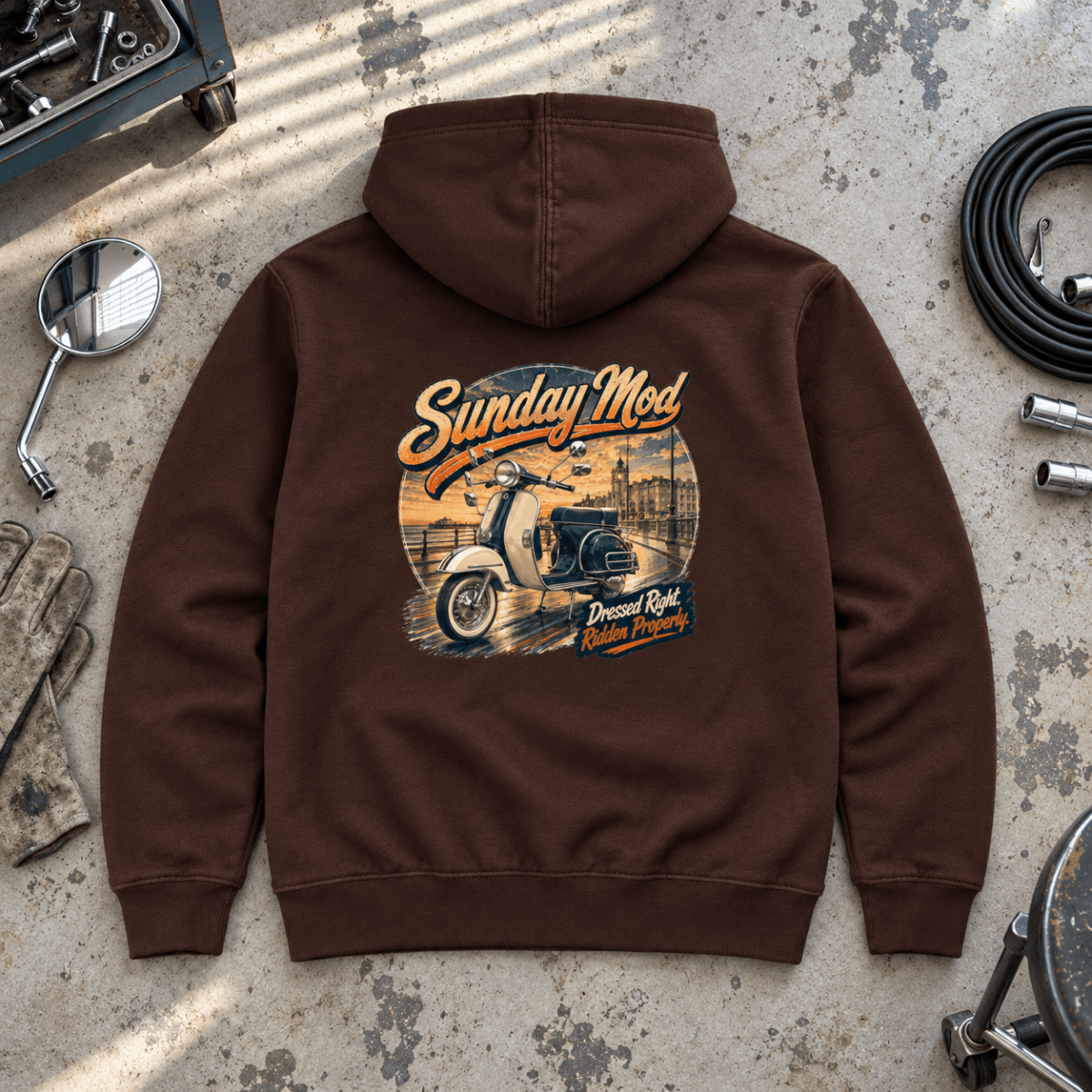 Sunday Mod classic scooter brown hoodie back hero in a retro repair bay