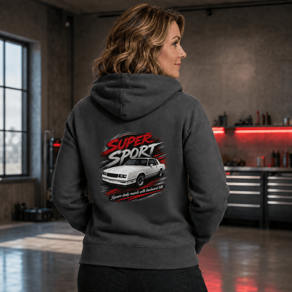 Model wearing a dark grey square-body muscle coupe graphic hoodie, back print view