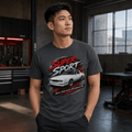 Model wearing a dark grey square-body muscle coupe graphic T-shirt, front view