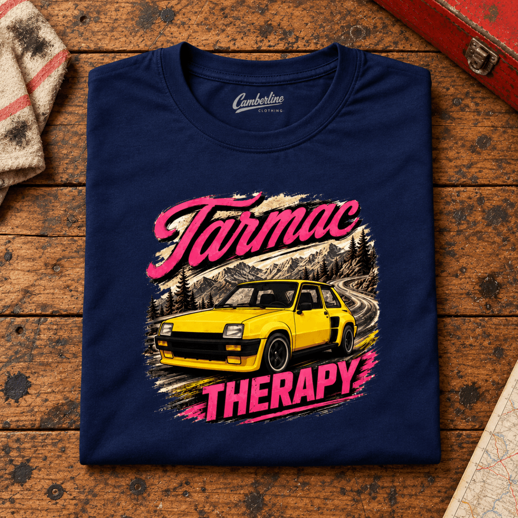 Hot Hatch Graphic T-Shirt – Tarmac Therapy Yellow Mountain Road, folded front main hero on a worn automotive workbench – car-ts-0013