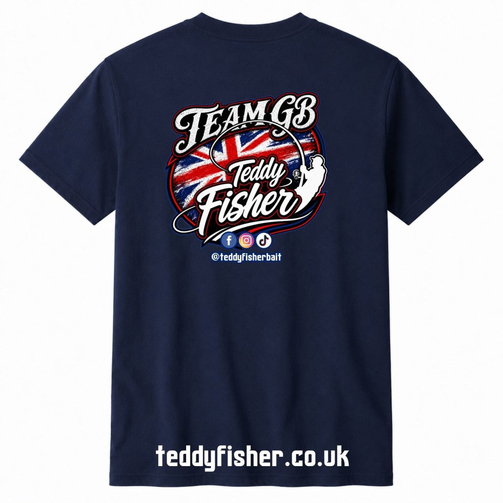 A navy blue short-sleeve t-shirt shown from the back, featuring a large graphic print with 'Team GB Teddy Fisher' in white script over a Union Jack flag design. The bottom of the image has the website 'teddyfisher.