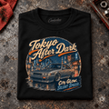 Classic Coupe Graphic T-Shirt – Tokyo After Dark Drift JDM Night Culture, folded front main hero on a worn automotive workbench – car-ts-0065