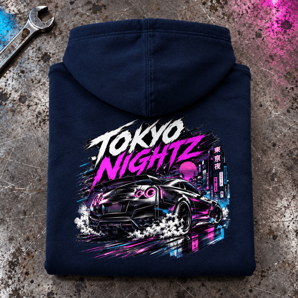 Folded navy tokyo nightz drift hoodie, rear print on a worn workshop bench — car-hd-0033
