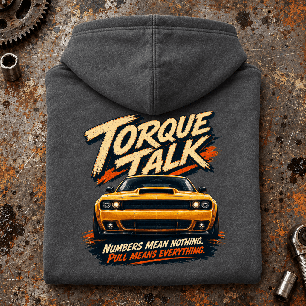 Muscle Car Graphic Hoodie – Torque Talk V8 Charcoal, folded back main hero on a worn automotive workbench – car-hd-0084