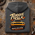 Muscle Car Graphic Hoodie – Torque Talk V8 Charcoal, folded back main hero on a worn automotive workbench – car-hd-0084