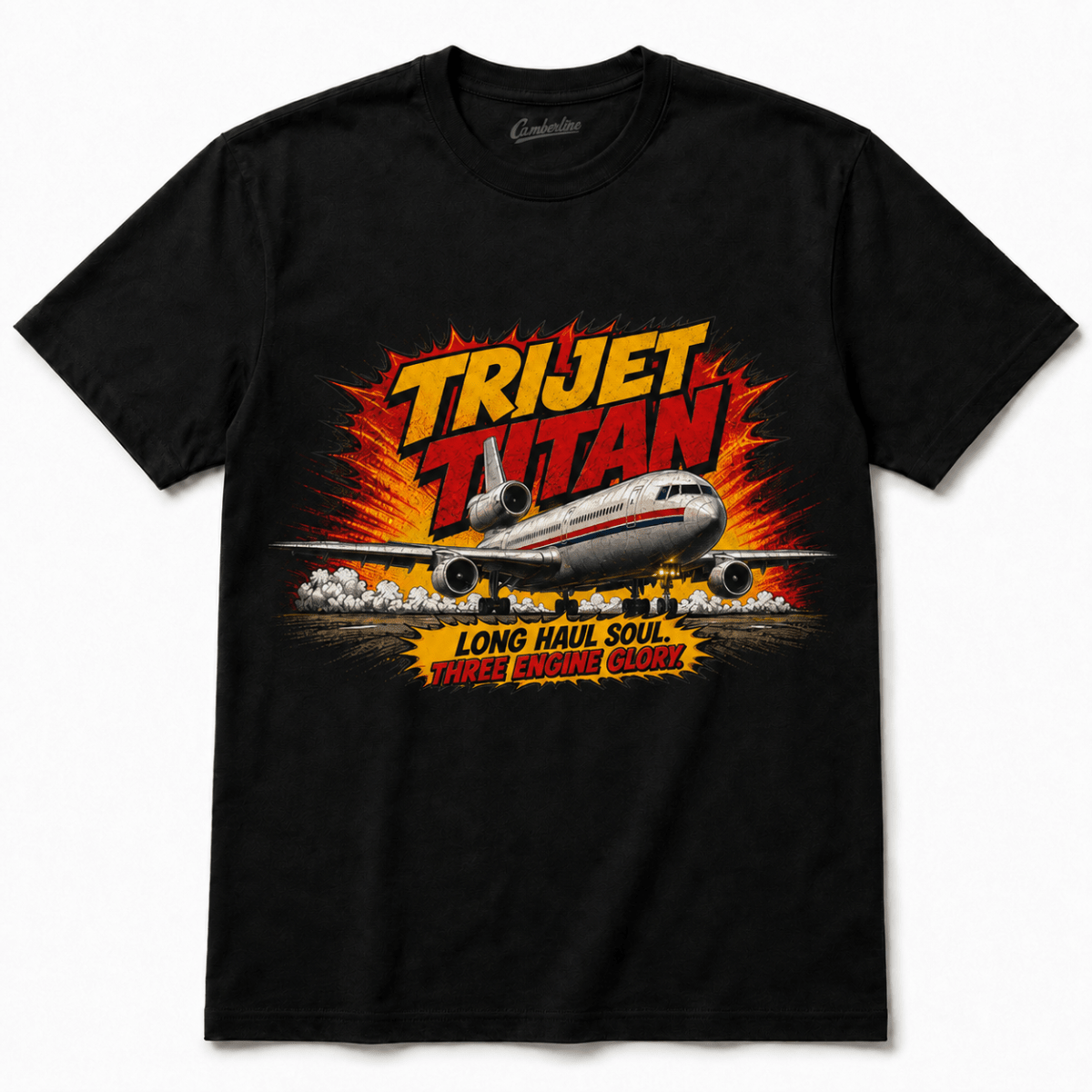 A black short-sleeve graphic t-shirt featuring a retro-style comic book illustration of a jet airplane with the text 'TRIJET TITAN' and 'LONG HAUL SOUL / THREE BURNING GUNS' on a white background.