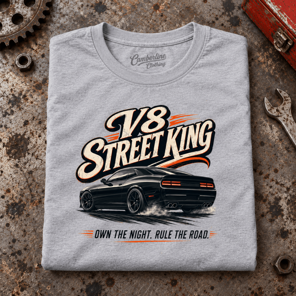 Muscle Car Graphic T-Shirt – V8 Street King American Iron, folded front main hero on a worn automotive workbench – car-ts-0063