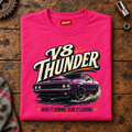 Folded hot pink V8 Thunder High Torque T-shirt front on a workshop bench — car-ts-0091