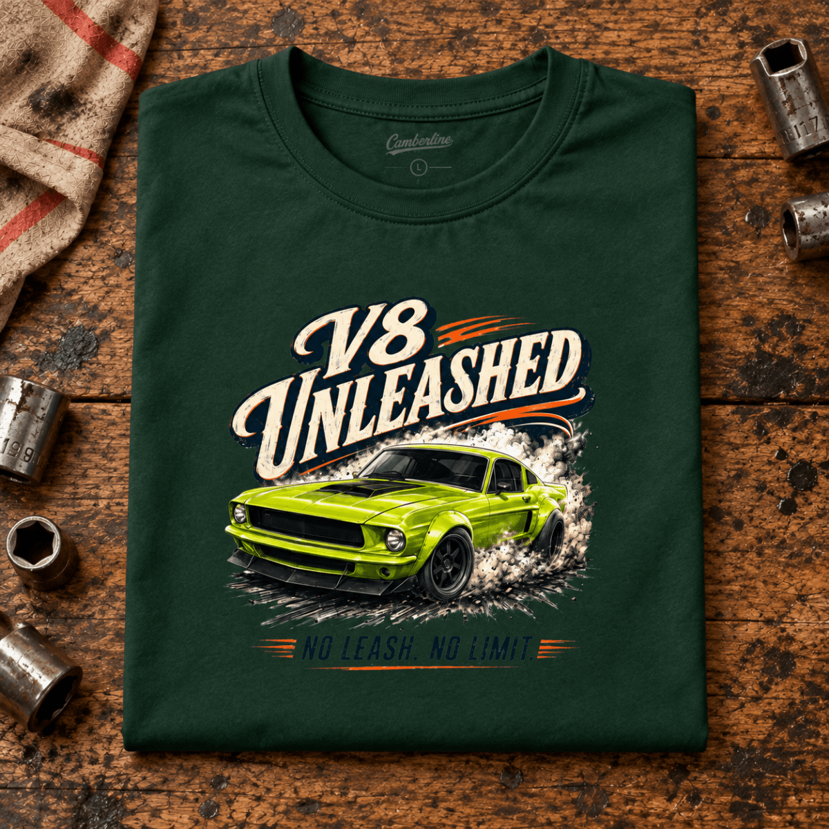 Muscle Car Graphic T-Shirt – V8 Unleashed Full Power, folded front hero on a worn automotive workbench – car-ts-0061