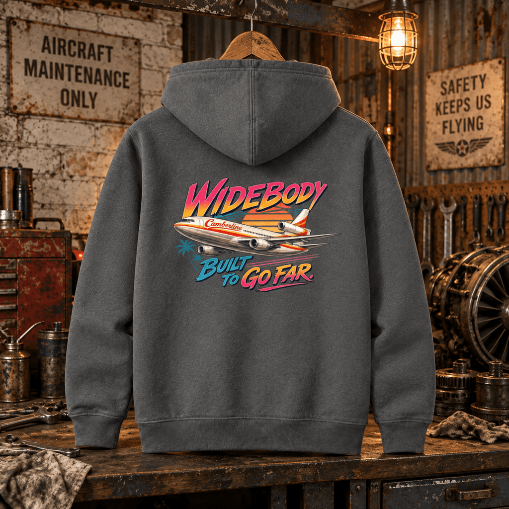 Charcoal Wide Body Built To Go Far trijet graphic hoodie in a gritty aviation workshop