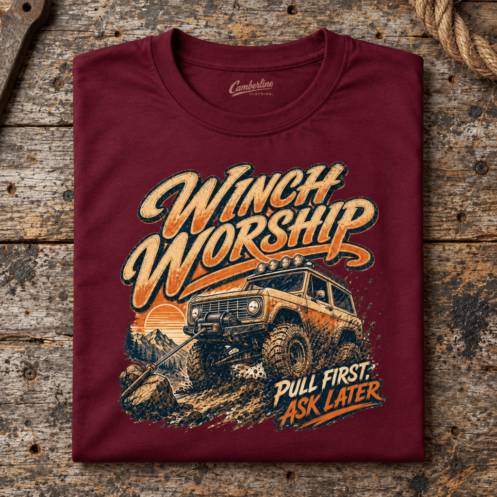 4x4 Off Road Graphic T-Shirt – Winch Worship, folded front main hero on a worn automotive workbench – car-ts-0085