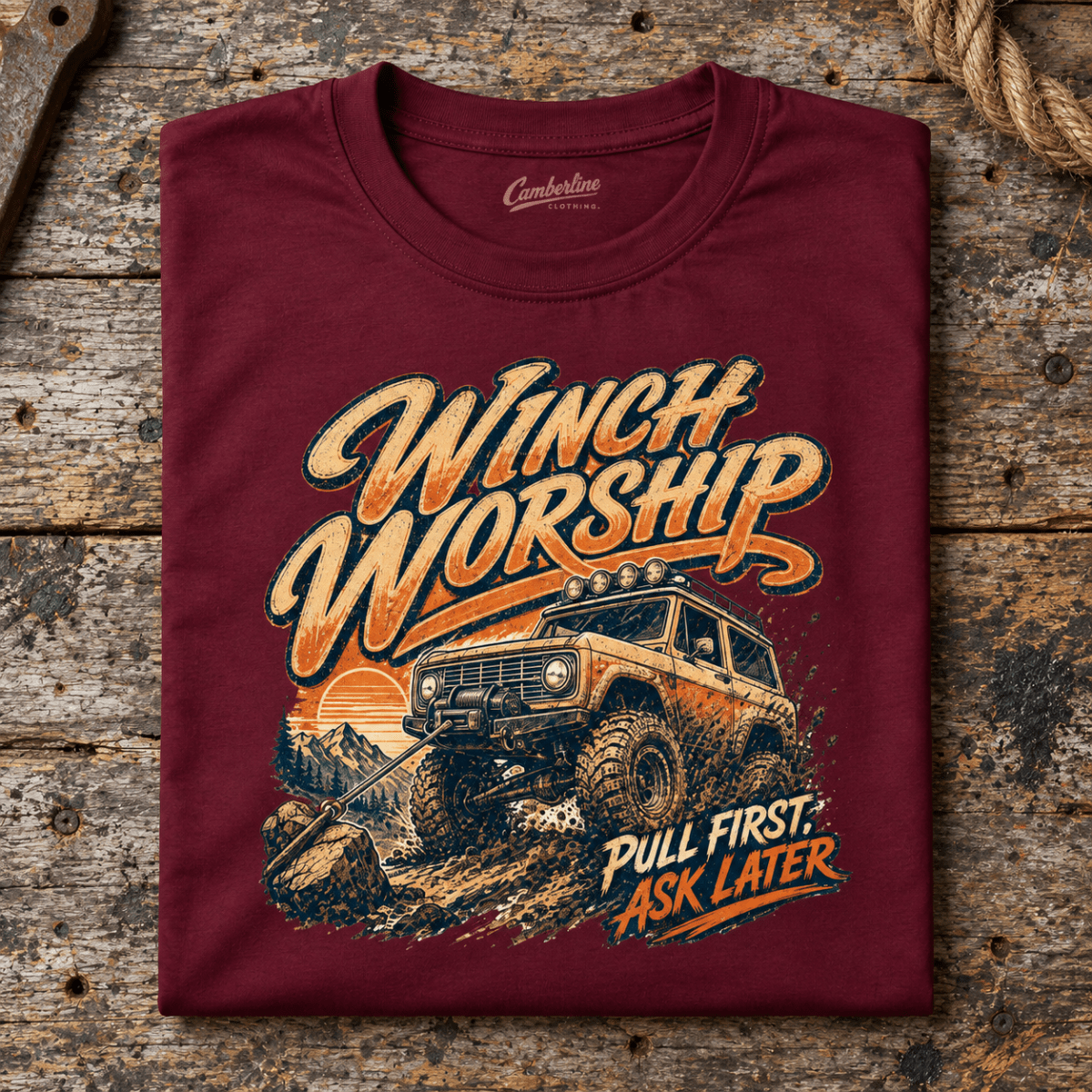 4x4 Off Road Graphic T-Shirt – Winch Worship, folded front main hero on a worn automotive workbench – car-ts-0085