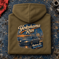 Hot Hatch Graphic Hoodie – Yokohama Run JDM, folded back main hero on a worn automotive workbench – car-hd-0062